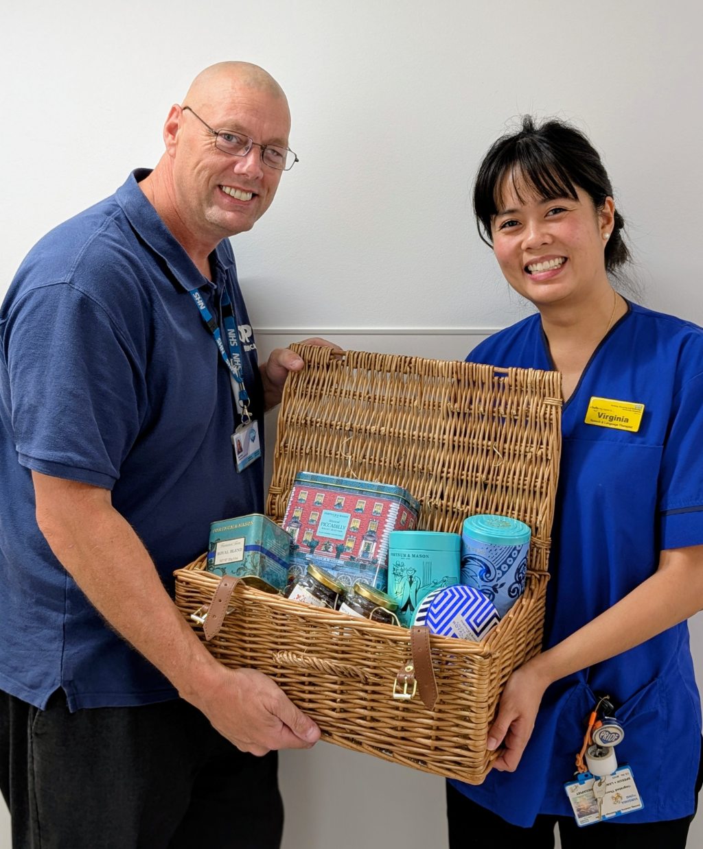 Customer survey winner presented with prize